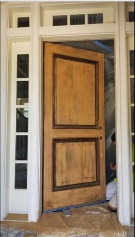 A door with two panels and a window.