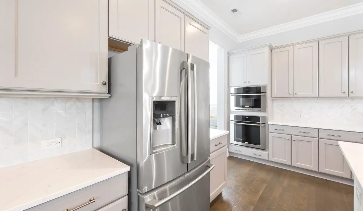 Modern kitchen featuring professionally finished cabinet repaint, offering Roselle homeowners an affordable alternative to replacement.