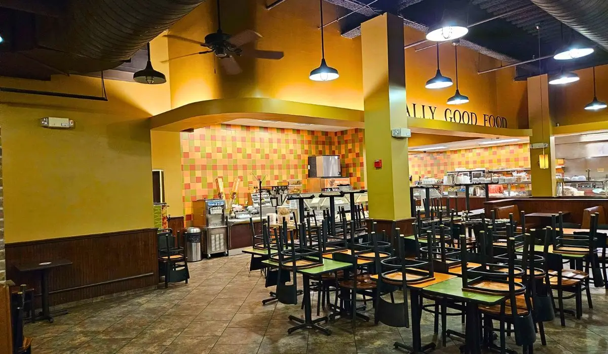 Restaurant interior painted with warm colors using professional paint solutions to create a welcoming commercial dining space.