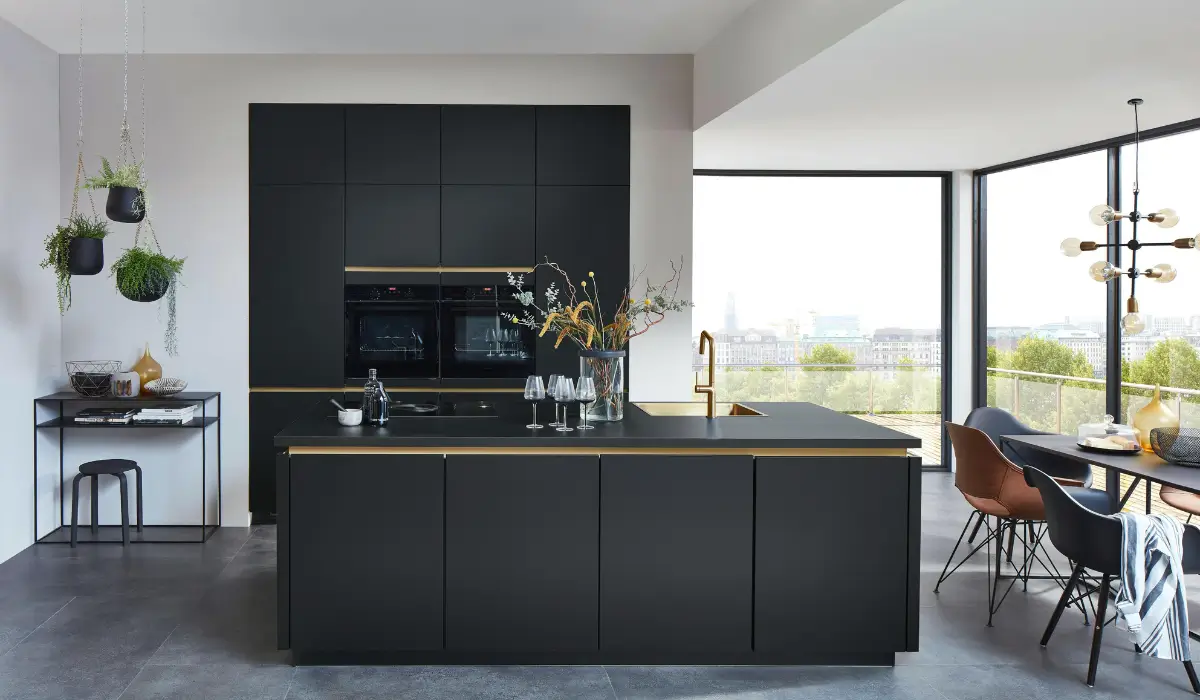 Top kitchen cabinet colors featuring deep charcoal and soft black cabinets in a sleek Glen Ellyn IL kitchen design for 2025.