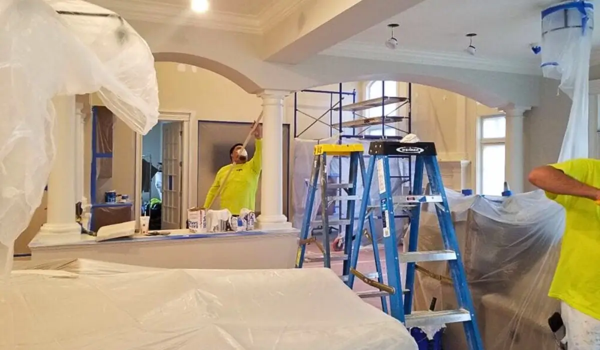 Residential interior painting project with full room protection in Downers Grove.